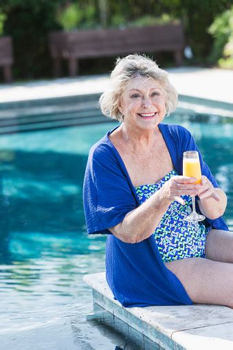 12,646 Older Woman In Bathing Suit .